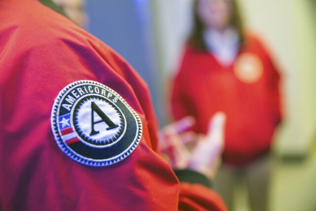 ɫƵ AmeriCorps red jacket