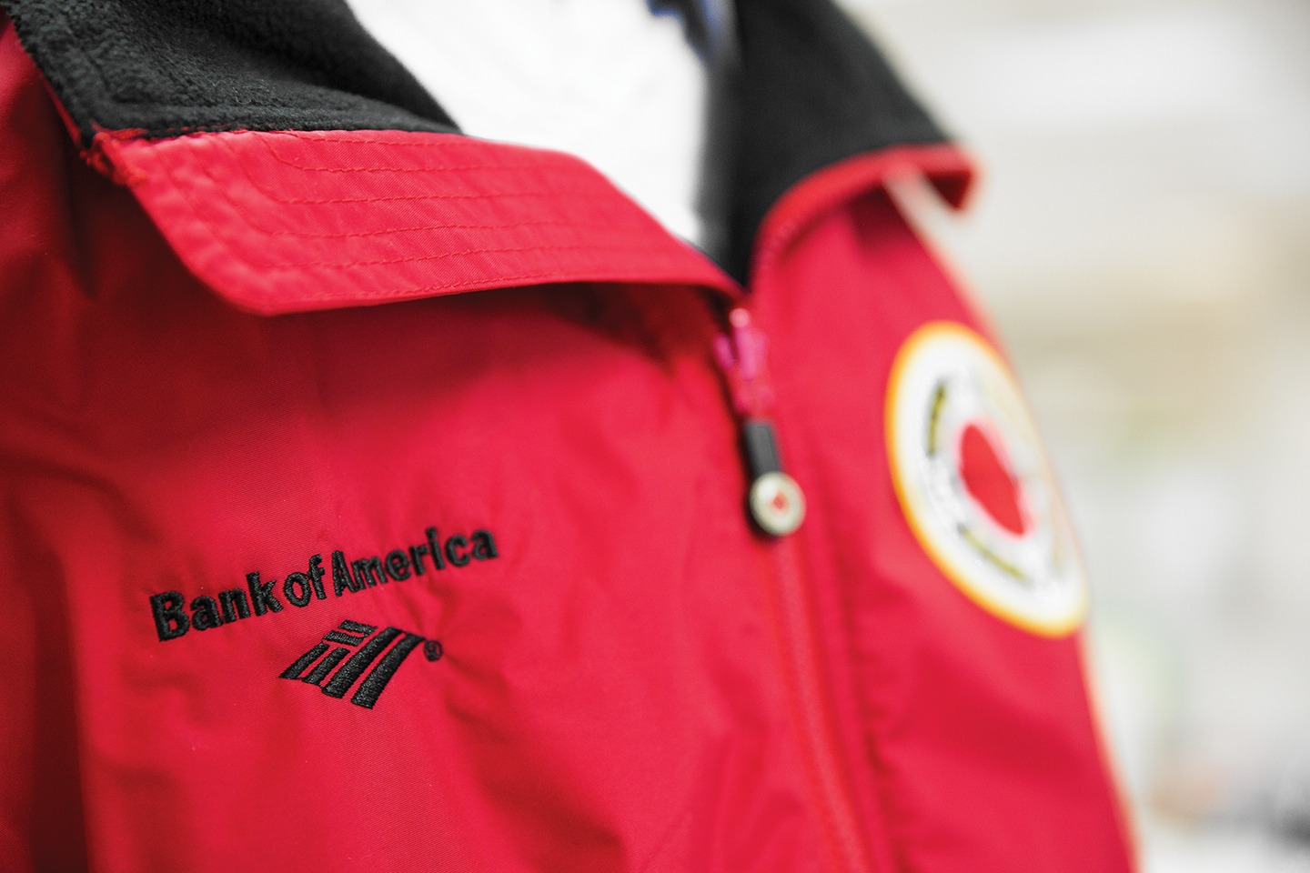 Red jacket with Bank of America logo and ɫƵ logo