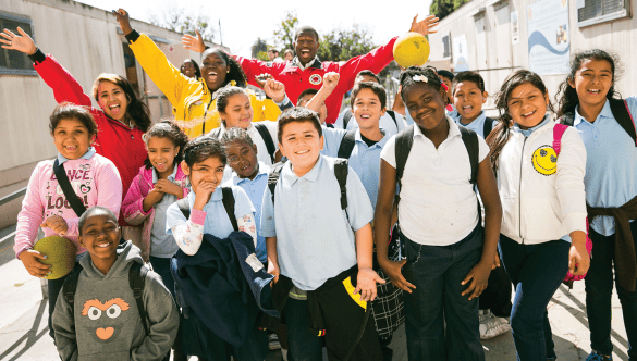 ɫƵ AmeriCorps members with students at school